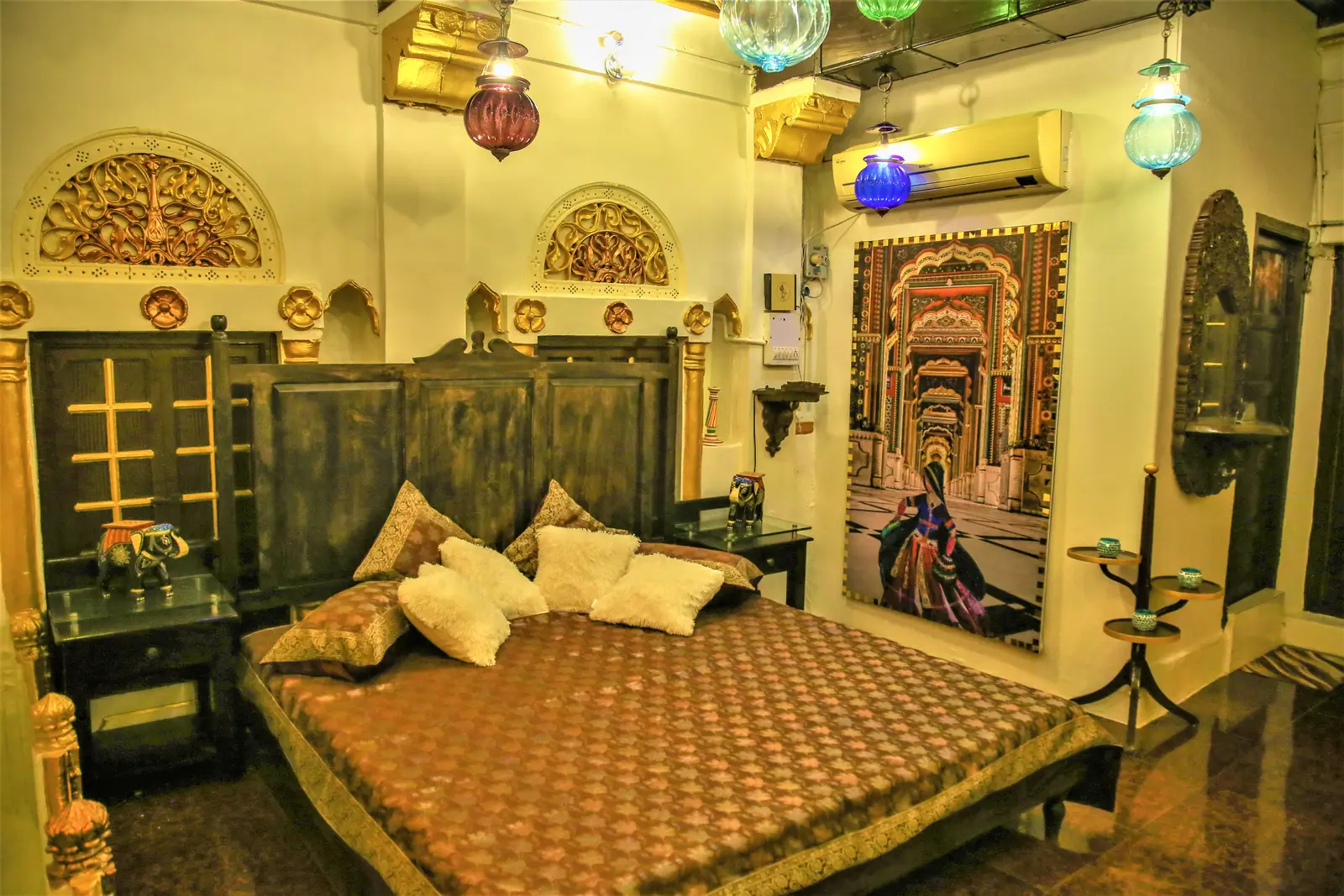 Antique carved furniture and restored heritage decor inside the Heritage Super Deluxe Room in Jodhpur