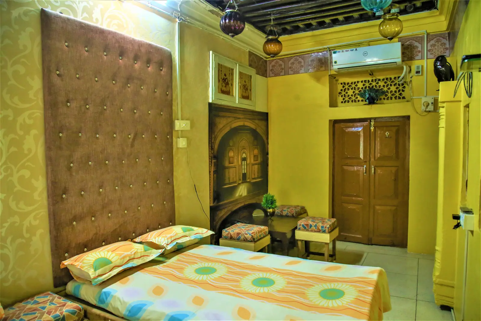 Majestic Deluxe Room, Saji Sanwri Heritage Inn Haveli Jodhpur Majestic Deluxe Room with tufted headboard and twin queen beds and a city view in Jodhpur